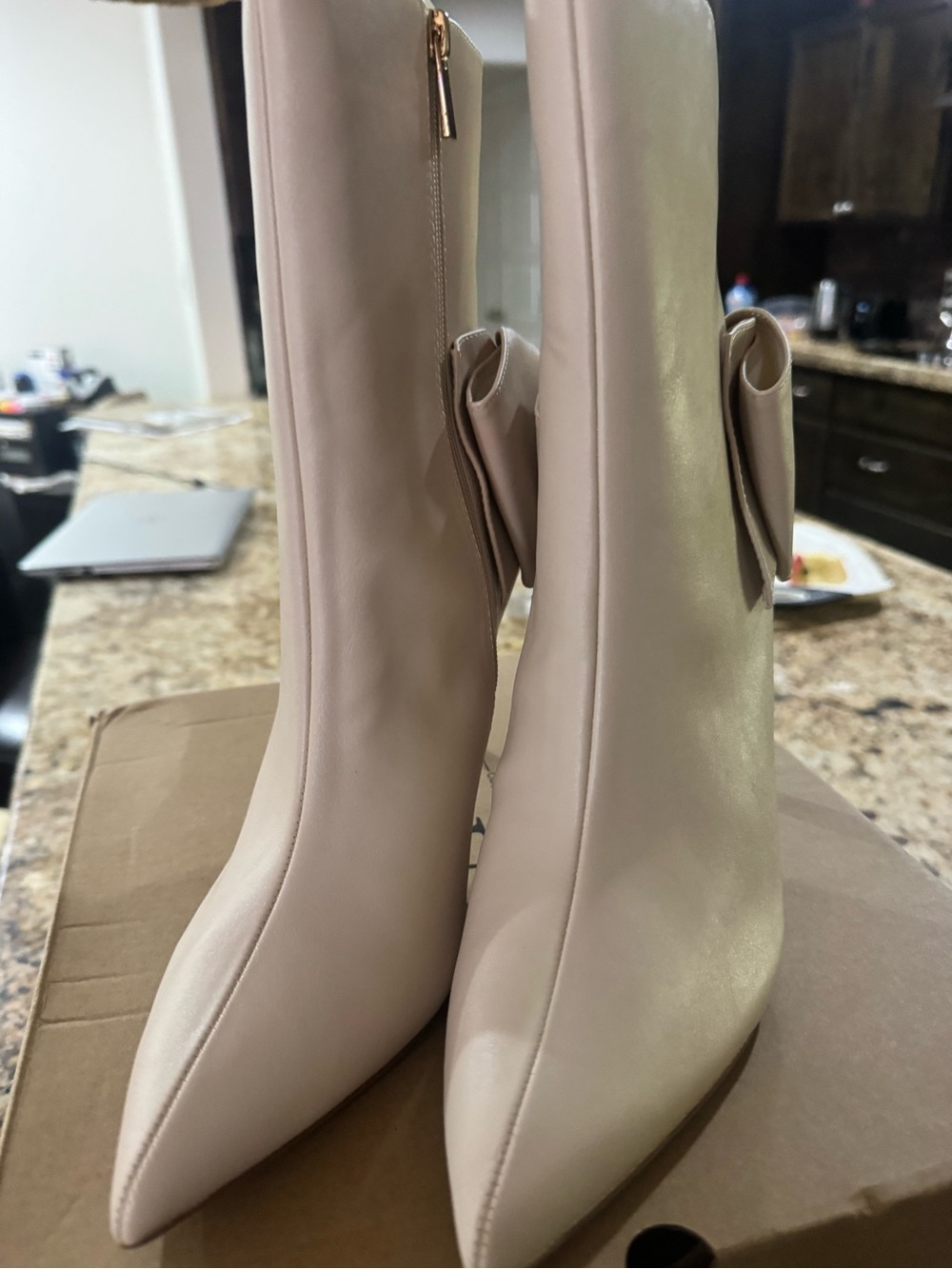 Pointed-Toe Cream Ankle Boots with Side Bow